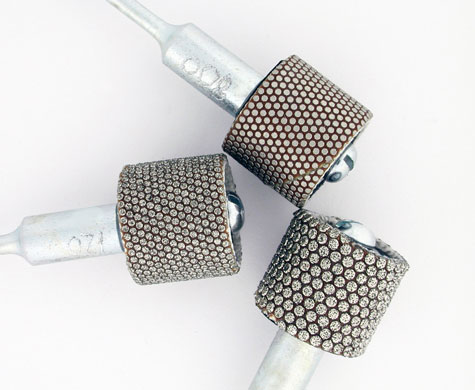 Three 3M Flexible Diamond abrasive bands; numbers are visible on the shaft