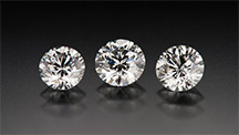 GIA Lab round brilliant diamonds. Left-to-right weight: 0.76, 0.82, 0.74 carats.