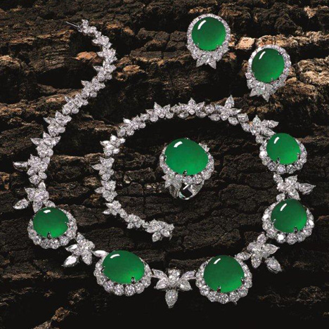 This jade and diamond set of necklace and earrings drew a winning bid of $3.78 million at the Tiancheng International auction in Hong Kong. The eight jade cabochons measured 20.13 mm x 17.13 mm x 9.73 mm and were set with 73.55 carats of diamonds. Courtesy of Tiancheng International.