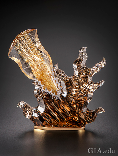 抽象派雕塑中的两块金红石石英，一明一暗。