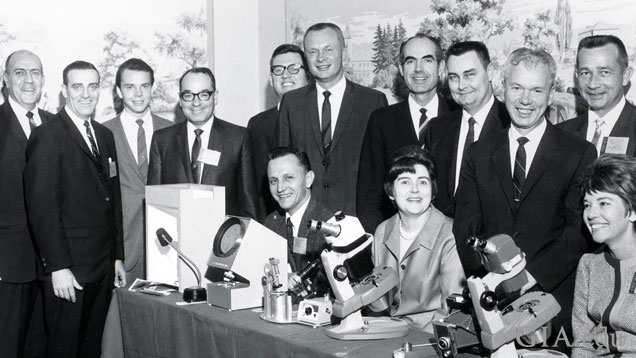 GIA staff at AGS Conclave in Chicago, 1968. Standing from left: Bert Krashes, Joe Murphy, John Charter, Richard T. Liddicoat, Bob Ernest, Glenn Nord, G. Robert (Bob) Crowningshield, Chuck Fryer, Ken Moore and Gale Johnson. Seated from left: Steven Zack, Eunice Miles and T.J. Barrows.