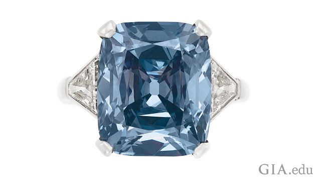 A Fancy Vivid blue diamond set in white metal ring