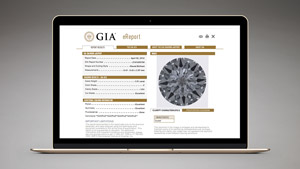 GIA 电子版钻石证书结果显示在笔记本电脑的屏幕上。