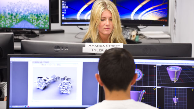 Students work on dual monitors in JDT class