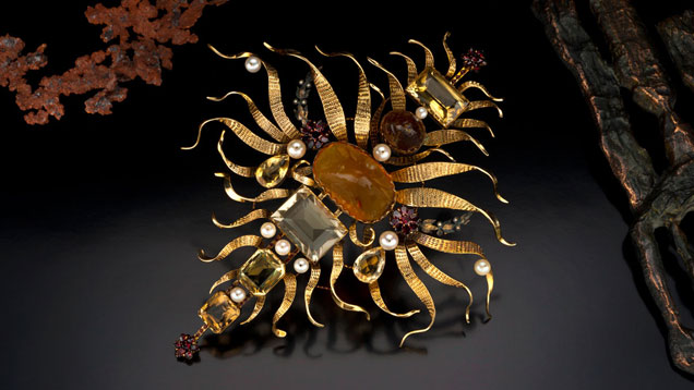 デュケット 太陽の原動力 ブローチ