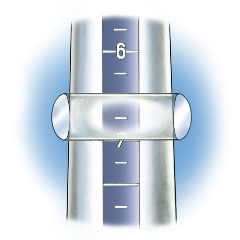 Close-up view of flat-top band positioned on plastic ring mandrel to check ring size. In this illustration the band is transparent so that the size is visible.