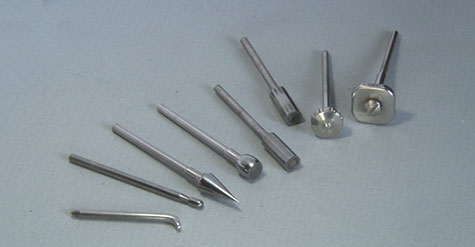 This small L-shaped burnisher was fashioned from a used rotary tool. It is ideal for moving metal into depressions. It leaves an irregular finish on platinum that will need some abrasive finishing and light polishing.