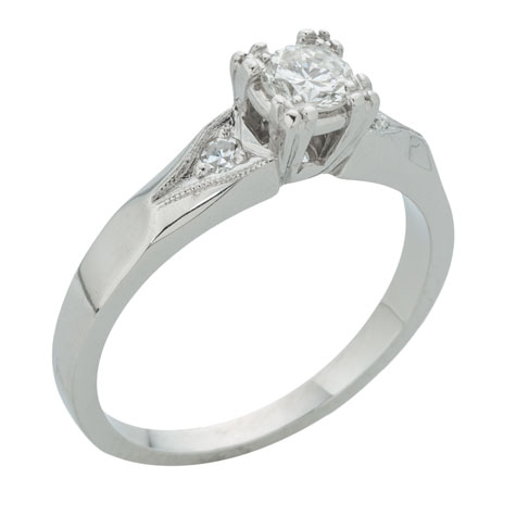 Perspective view of a platinum solitaire with a decorative shank featuring sides stones and millgrain detail