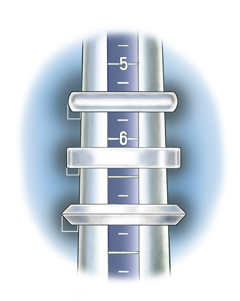 Illustration of three rings of varying thickness on a ring mandrel